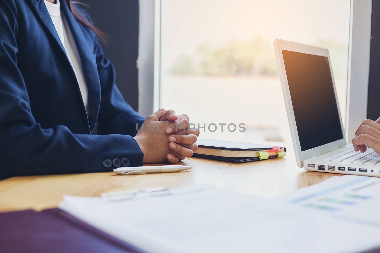 Business woman signing a loan for investment, negotiation by numberone9018