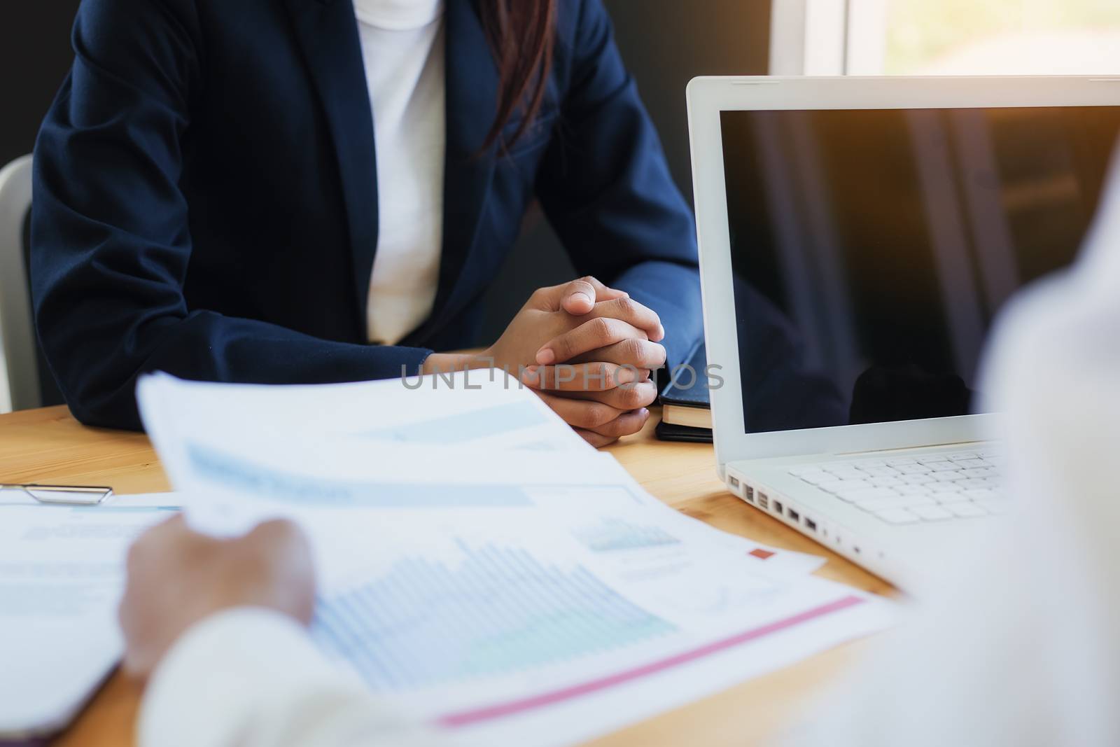 Business woman signing a loan for investment, negotiation