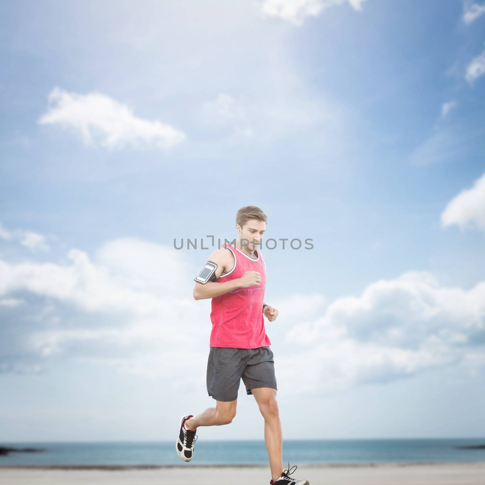 Composite image of fit man running by Wavebreakmedia