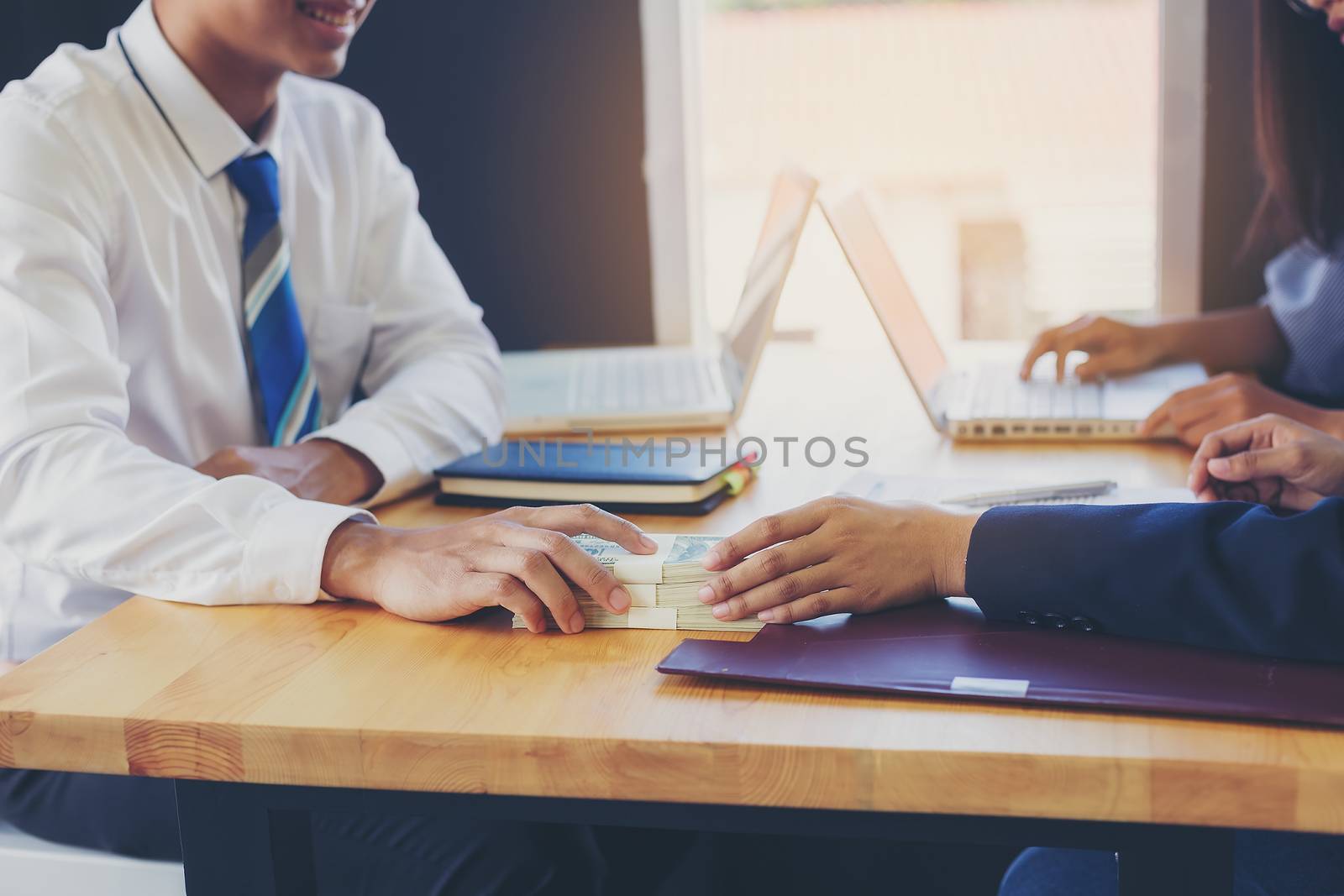 Business woman signing a loan for investment, negotiation