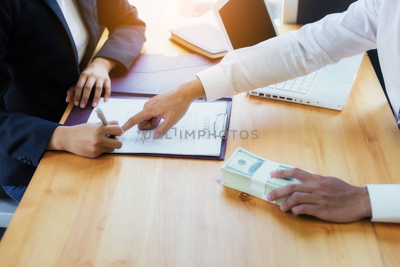 Business woman signing a loan for investment, negotiation by numberone9018