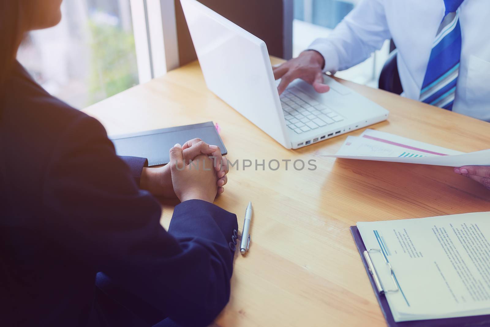 Business woman signing a loan for investment, negotiation