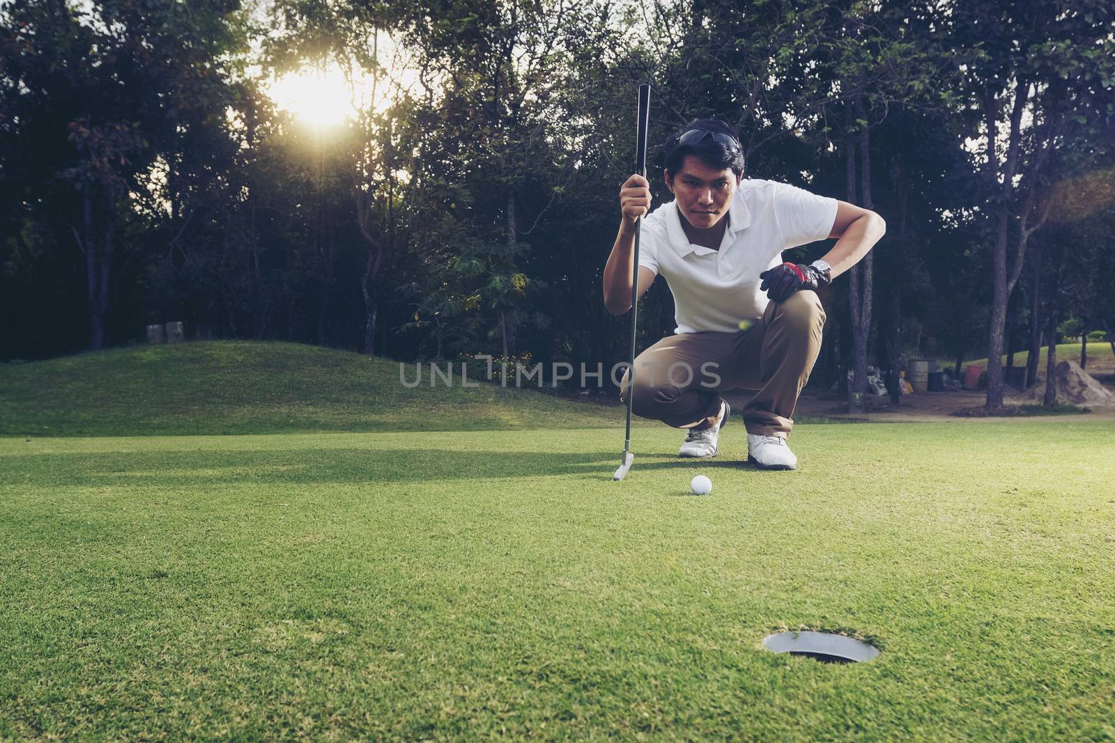 The goalkeeper was looking for a putt to score during the match.