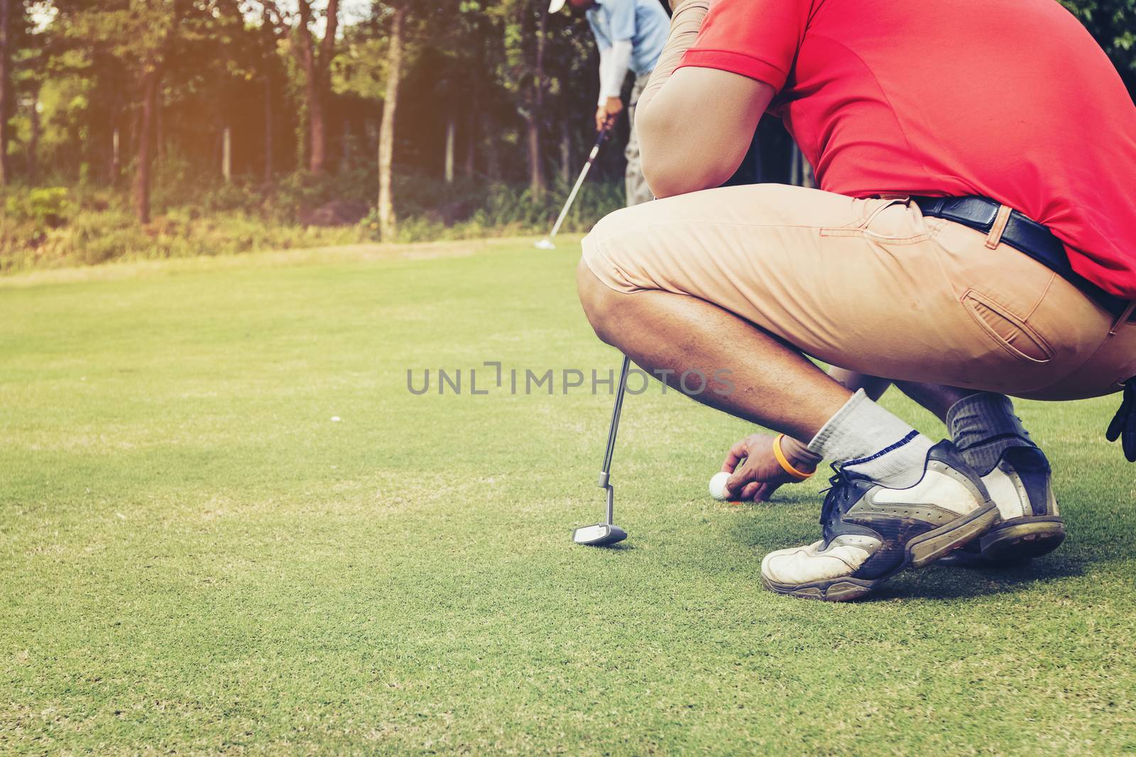 The goalkeeper was looking for a putt to score during the match.