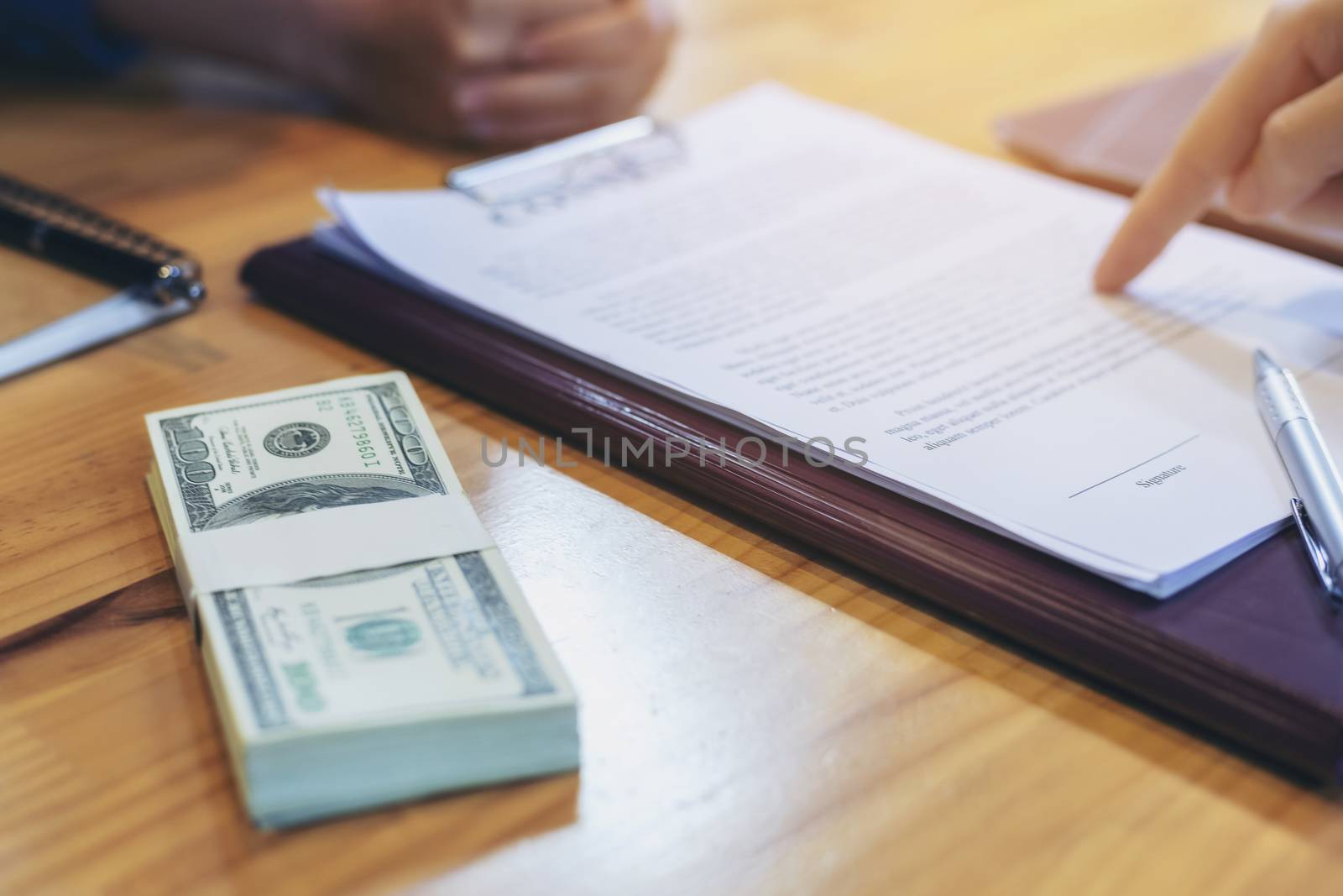 Businessman is signing a contract, business contract details, Signing and selling contracts