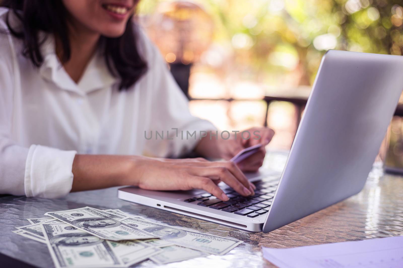 Young woman with credit card payment from shopping online