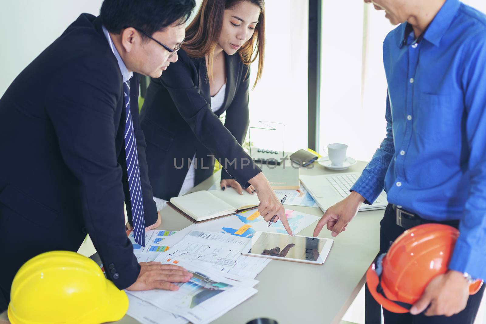 Photo young account managers crew working with new startup project. Idea presentation, analyze plans. Business meeting time. 