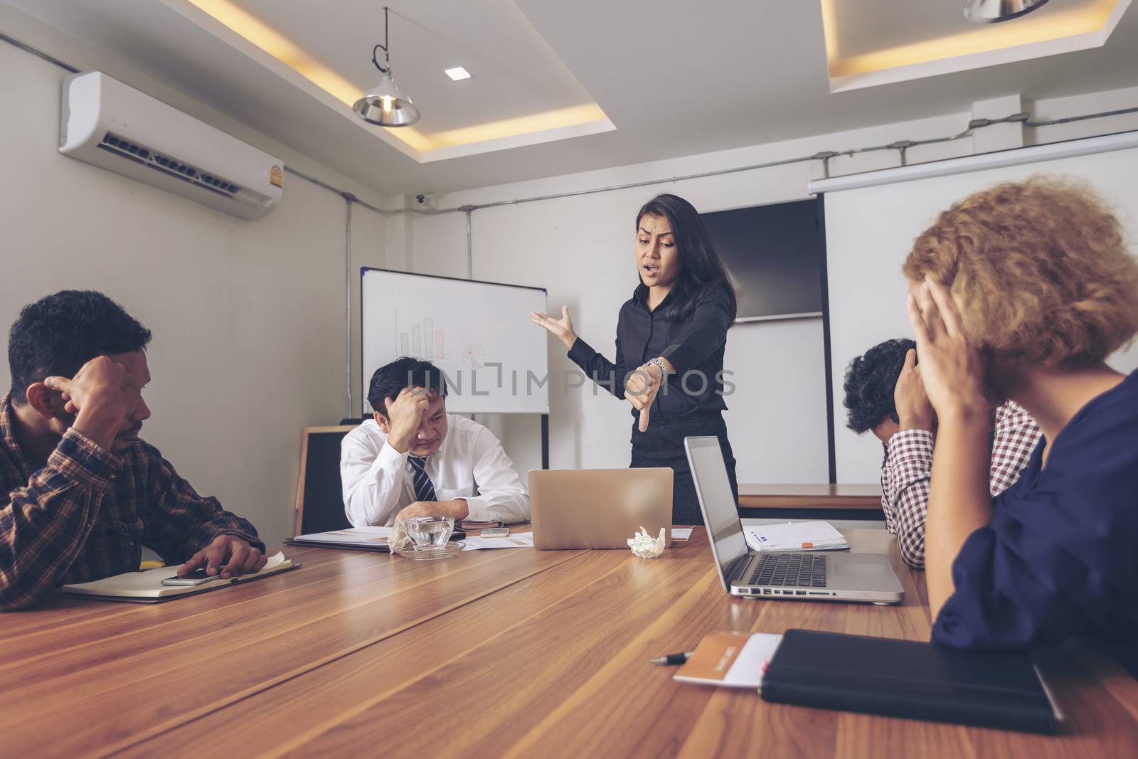 Business leader presenting new project. Businessman standing and leading business presentation. Male executive putting her ideas during presentation in conference room. 