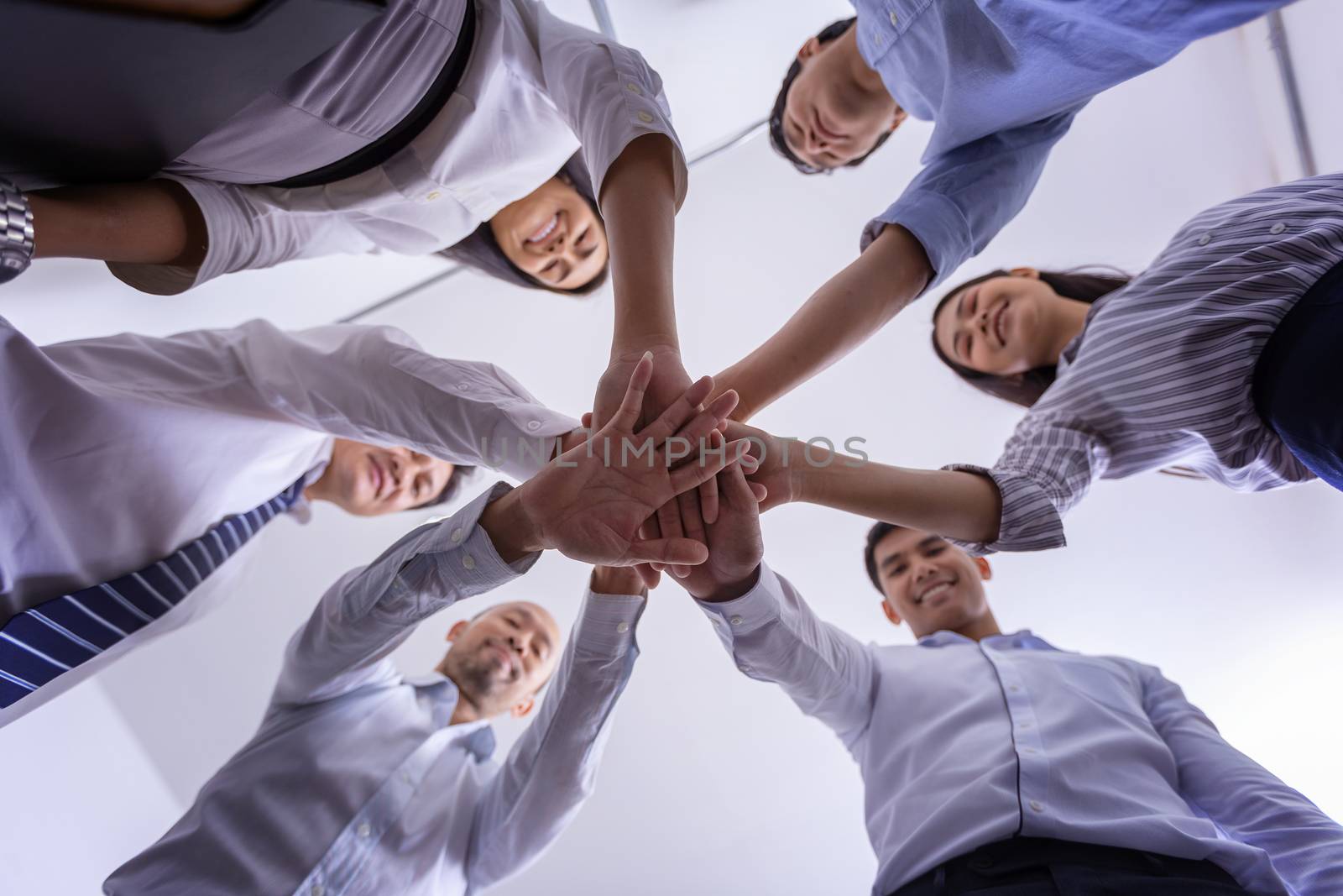 People hands harmonious friendship. Business team standing hands together. Teamwork togetherness collaboration concept