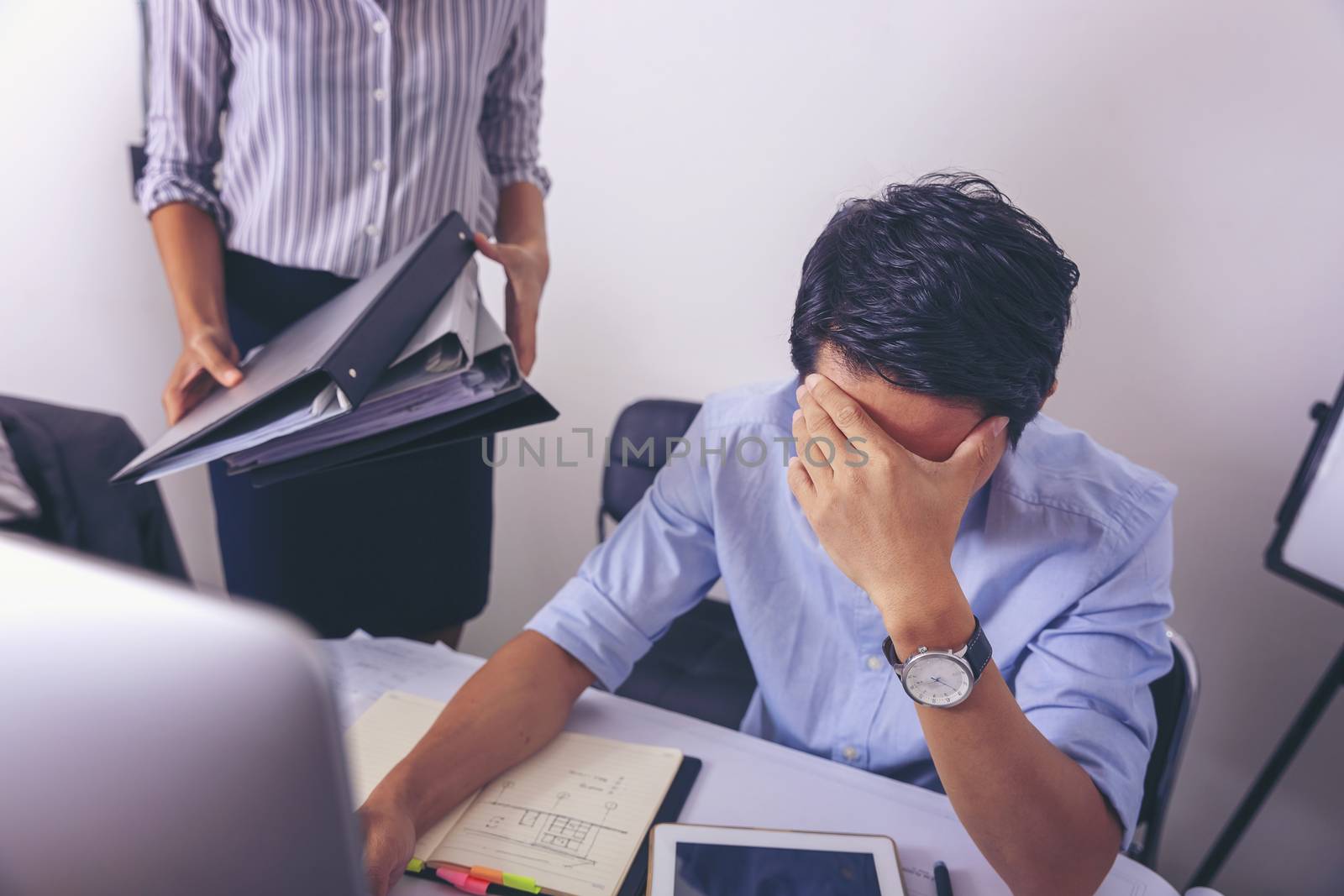 Stressed businessman concerned about hard work  in office, frustrated worried male employee work, tired exhausted office worker feeling headache at work