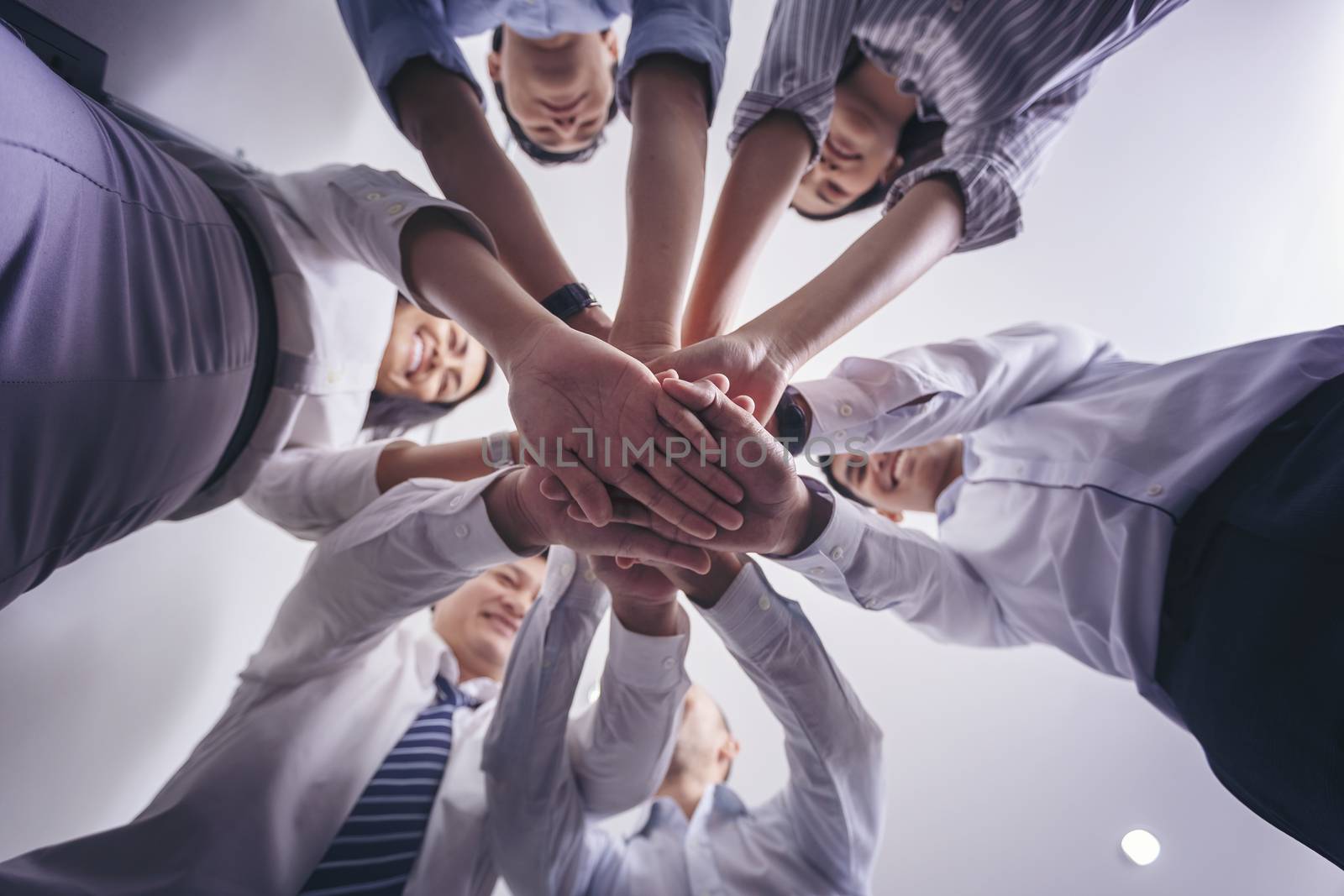 People hands harmonious friendship. Business team standing hands together. Teamwork togetherness collaboration concept