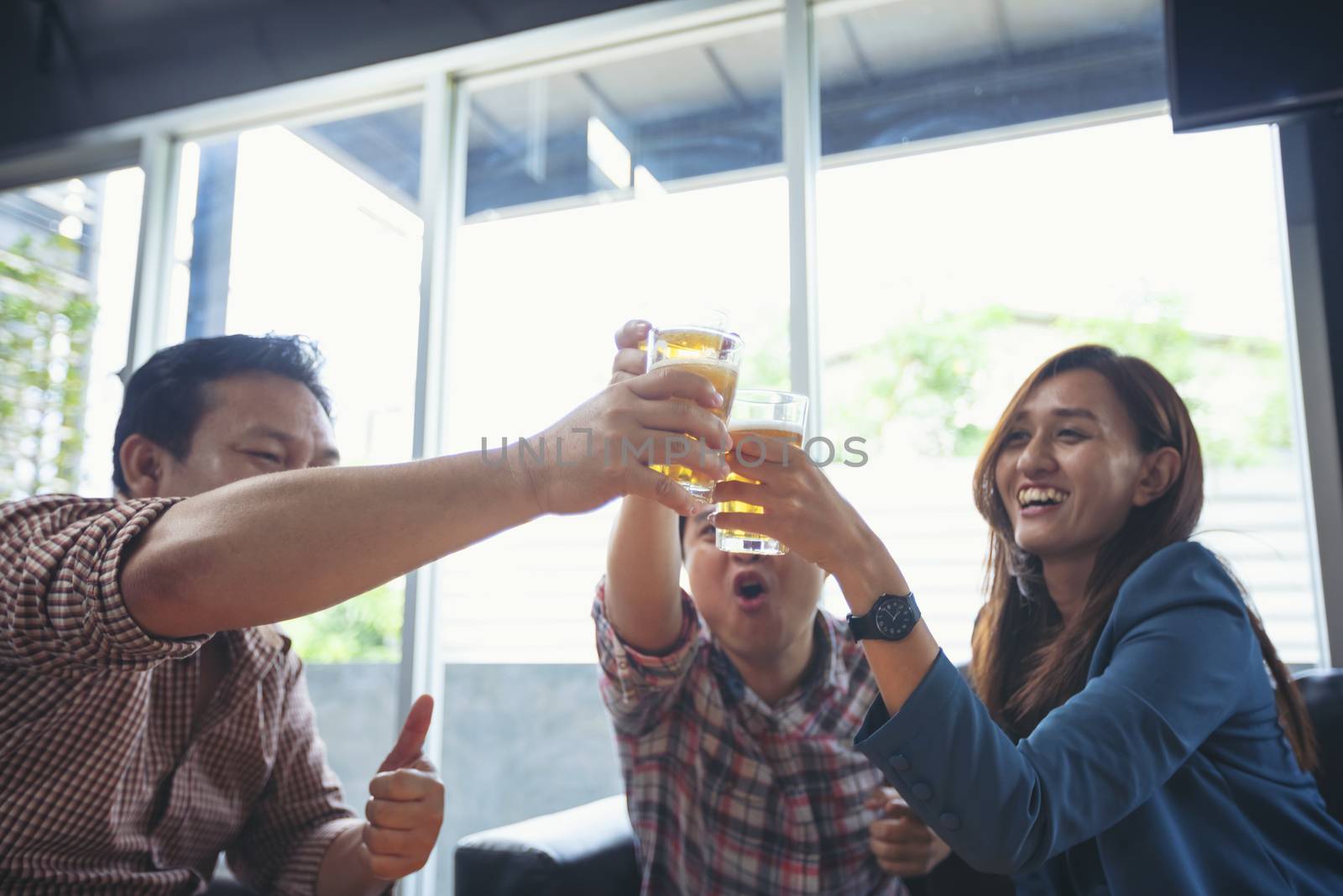 Business people are drinking to celebrate the success of their work.