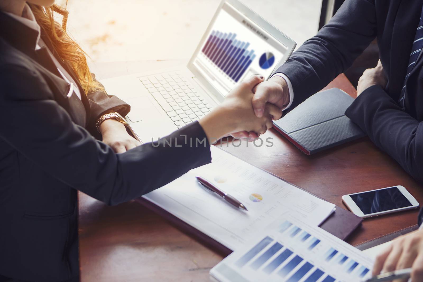 Businessmen shake hands After business negotiation