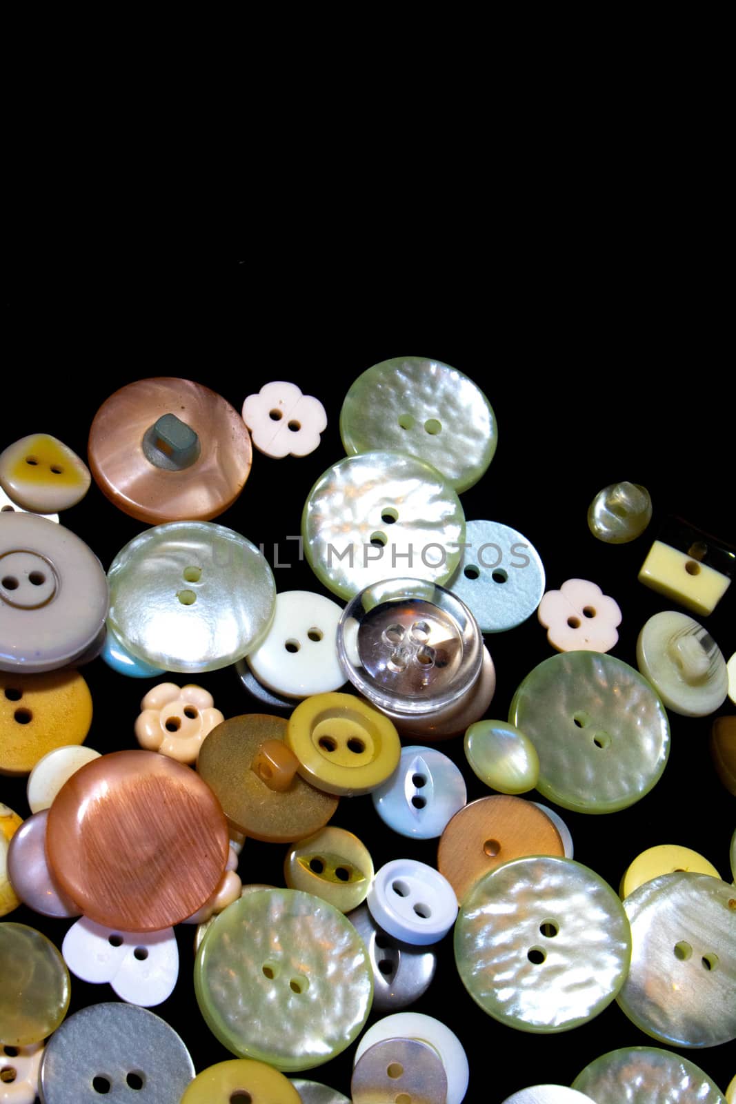 A Collection of Multicolour Different Size Buttons