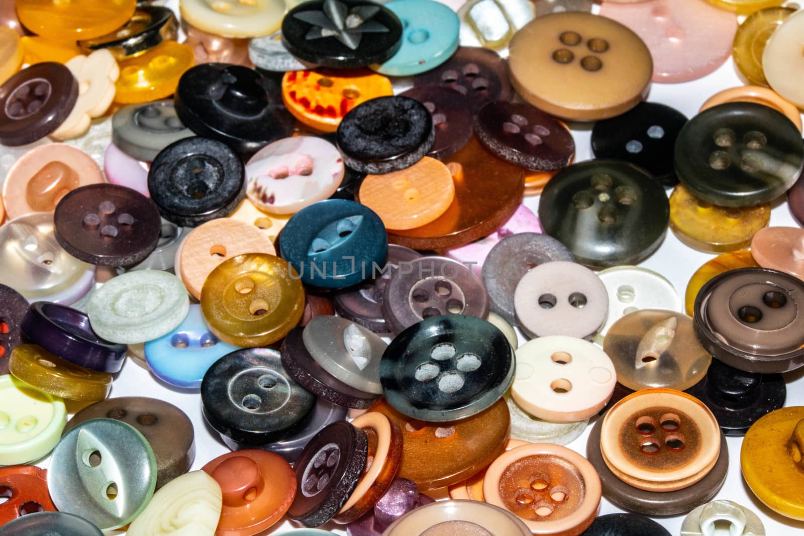 A Collection of Multicolour Different Size Buttons