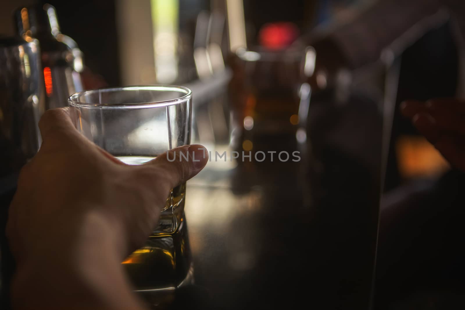 Cheers! Group of people cheering with drinks with alcohol. Celebration after successful 