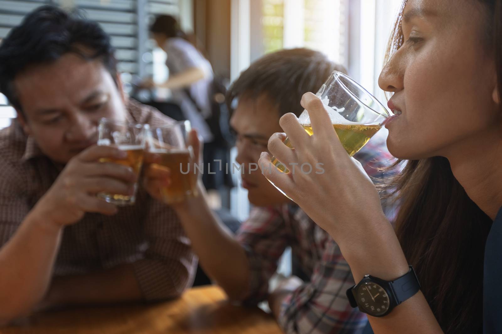 Business people are drinking to celebrate the success of their work.