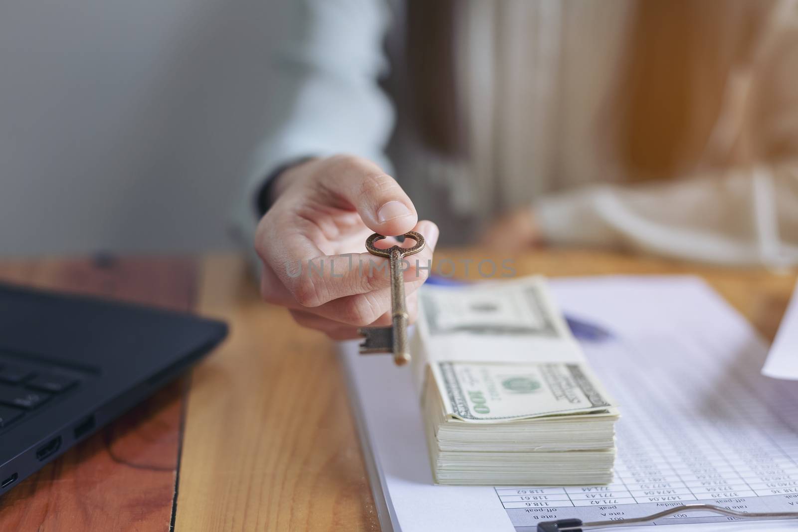 Successful business women are counting money and throwing a dollar at work happily.