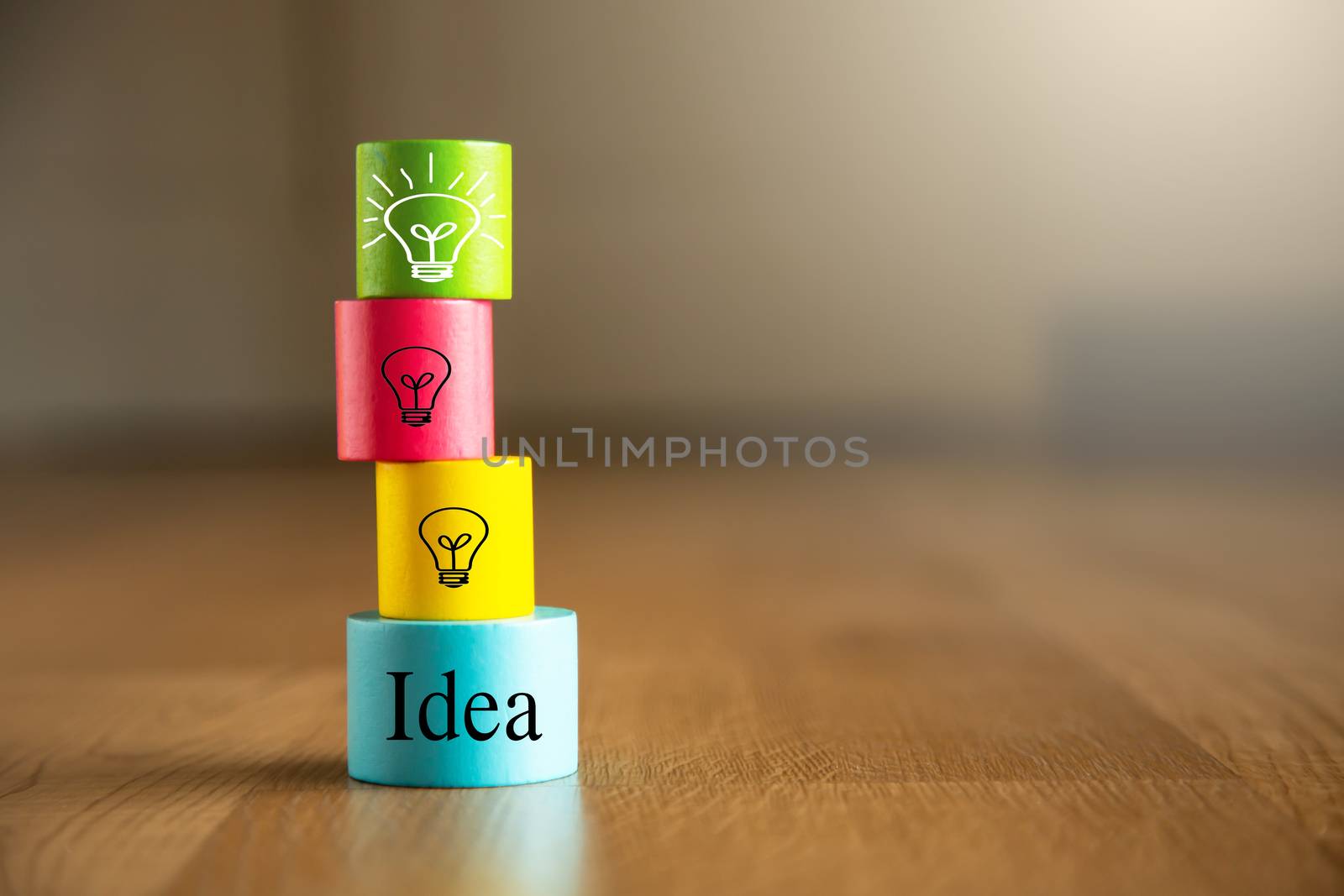 Concept creative idea and innovation. Wooden cube block with light bulb icon