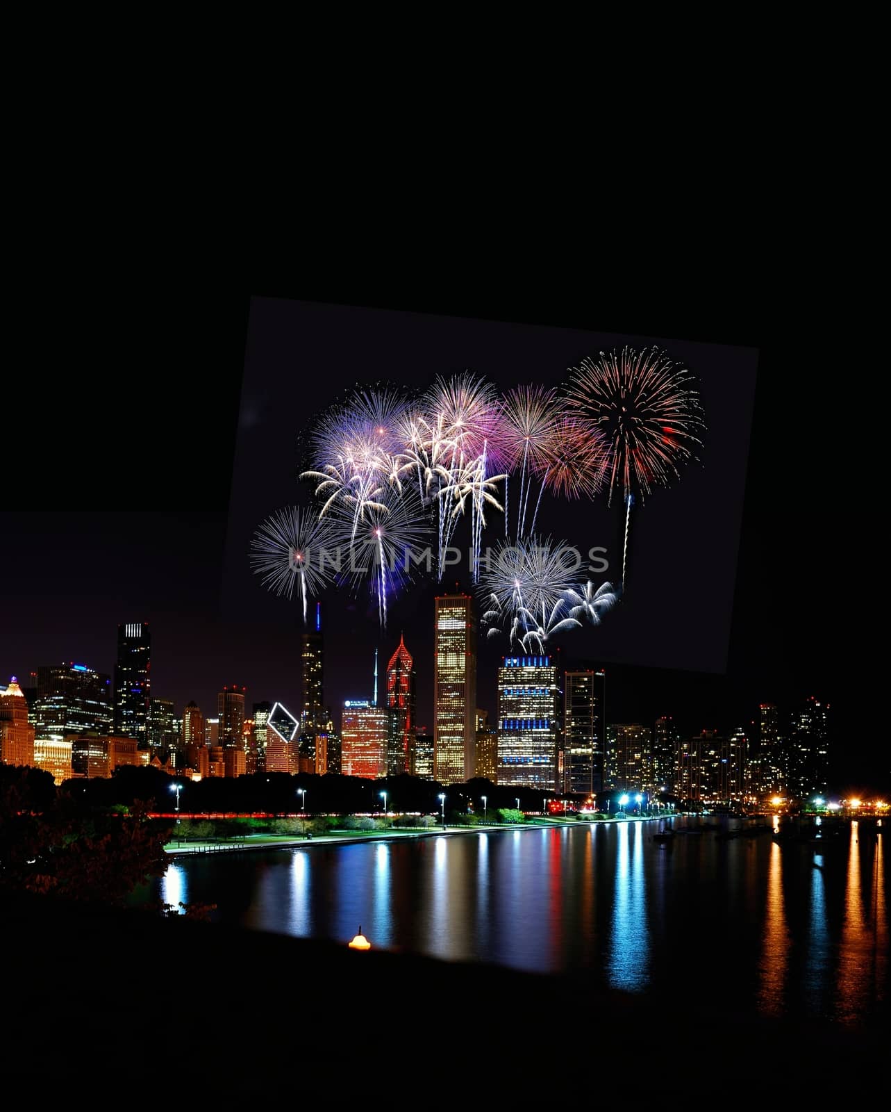 Chicago night skyline across Lake Michigan with fireworks.