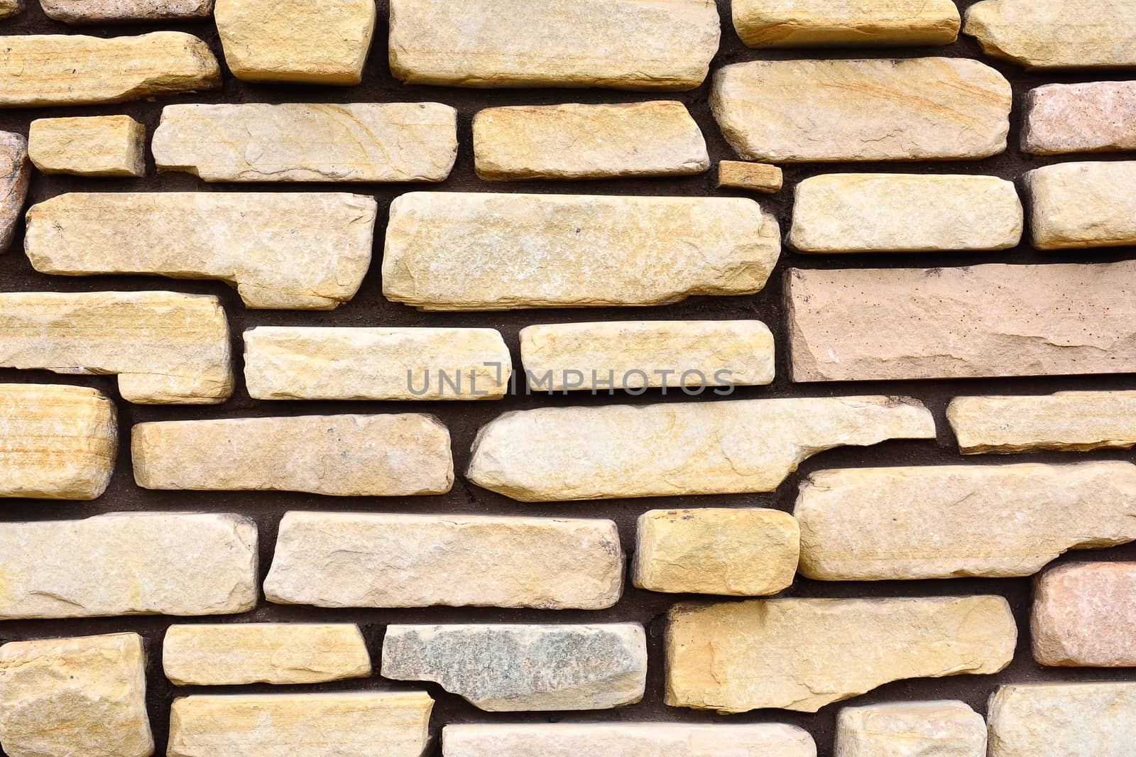 Ancient stone wall to use as background or texture.