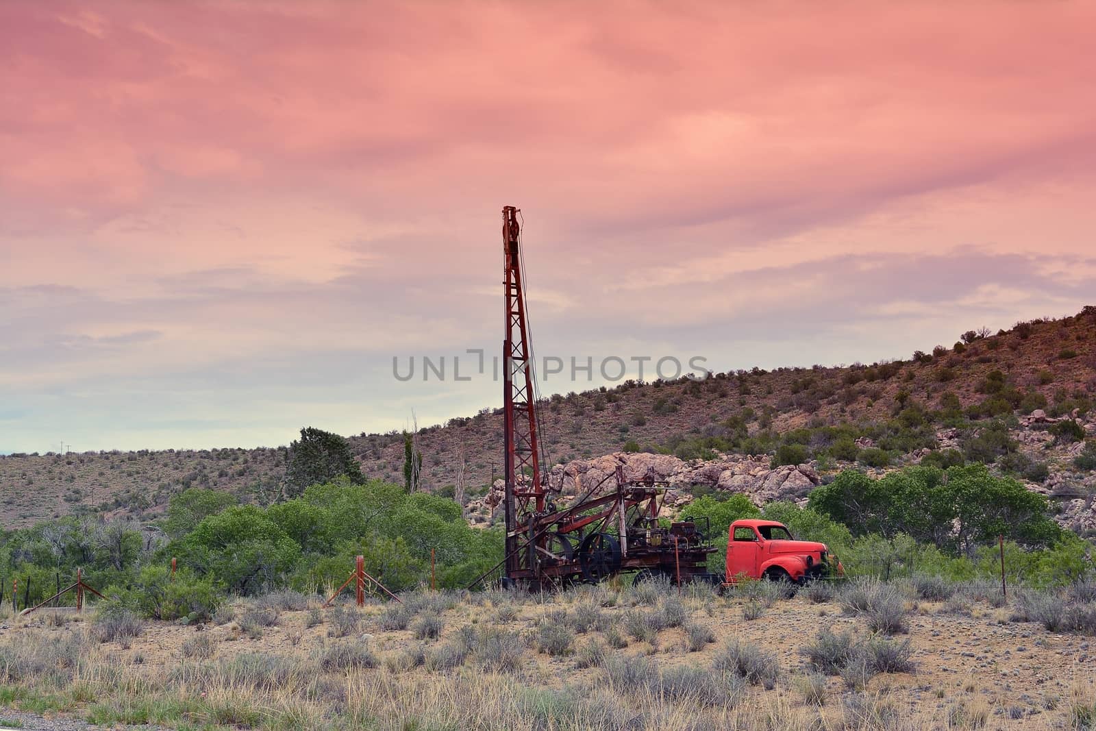 Groundwater hole drilling machine installed on the old truck. in Arizona.