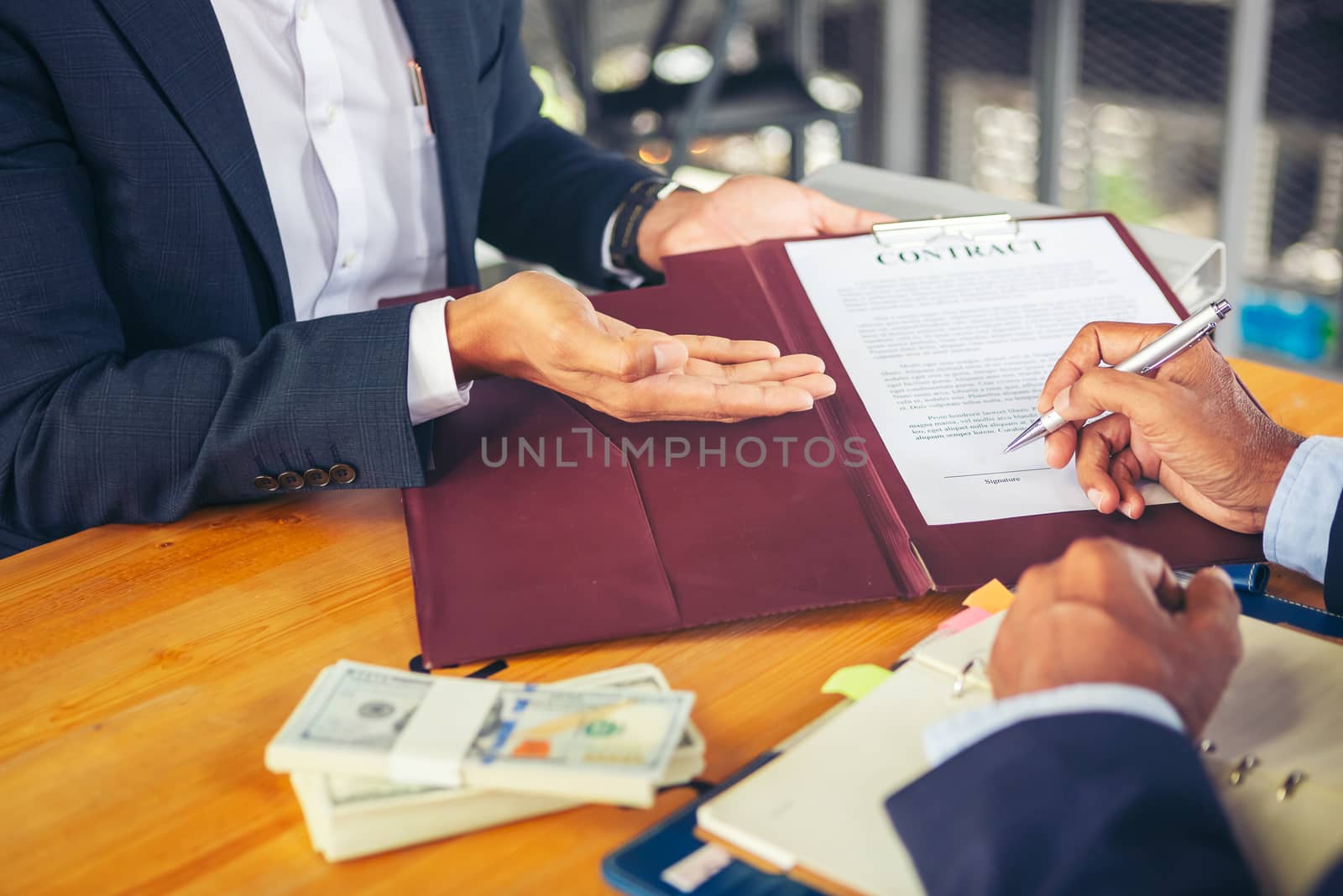 Close up business man signing contract making a deal. Business contract. agreement was signed co-investment business