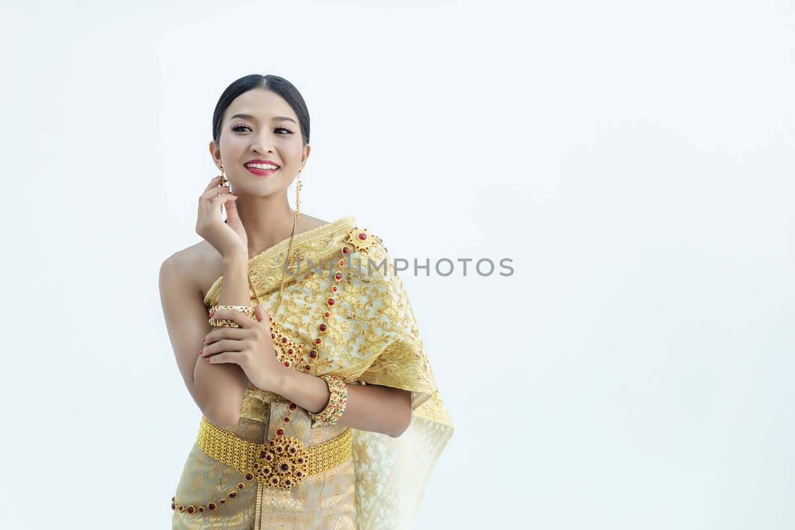 Beautiful Thai girl in traditional costume identity culture of thailand and has a beautiful smile that is a national identity