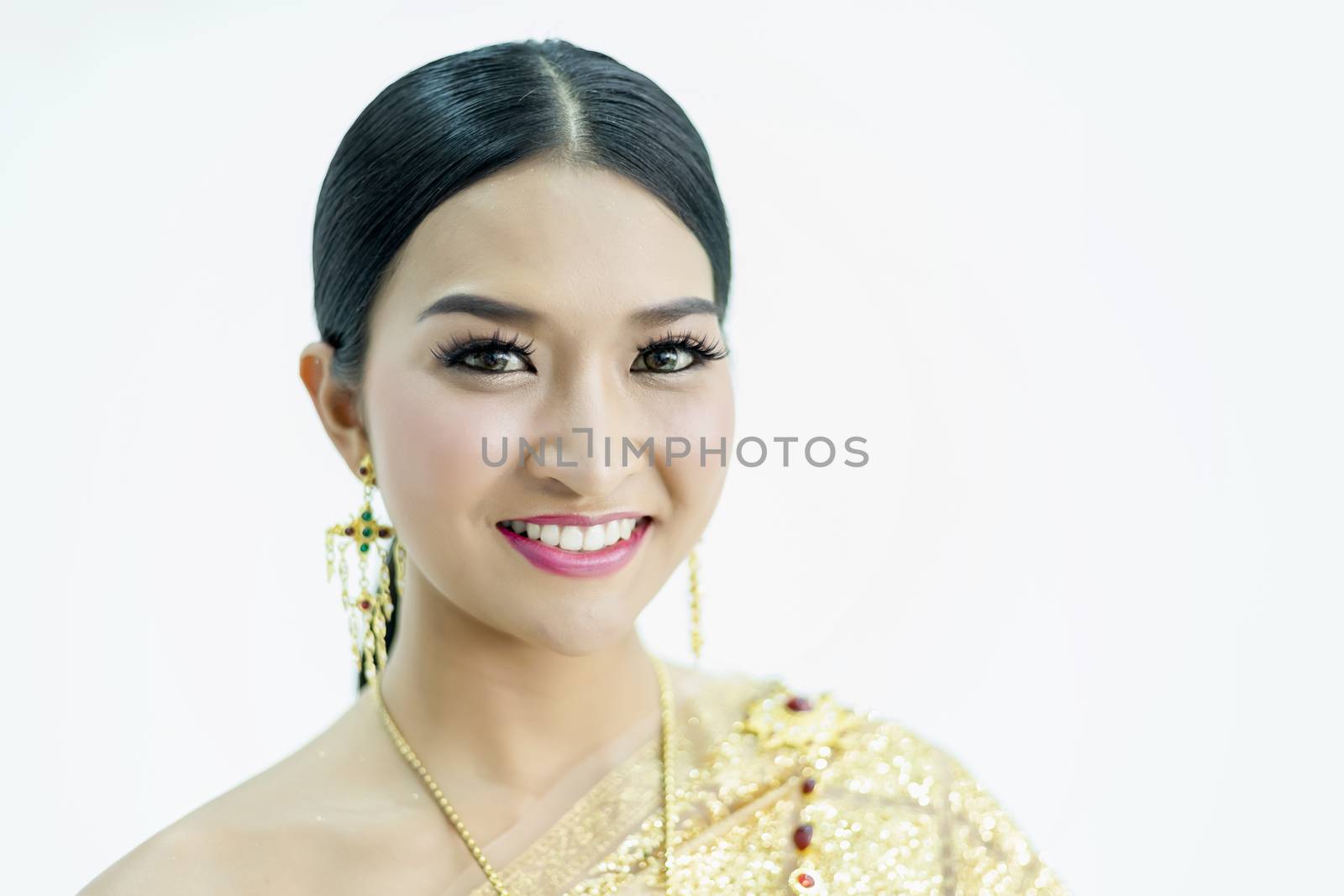 Beautiful Thai girl in traditional costume identity culture of thailand and has a beautiful smile that is a national identity