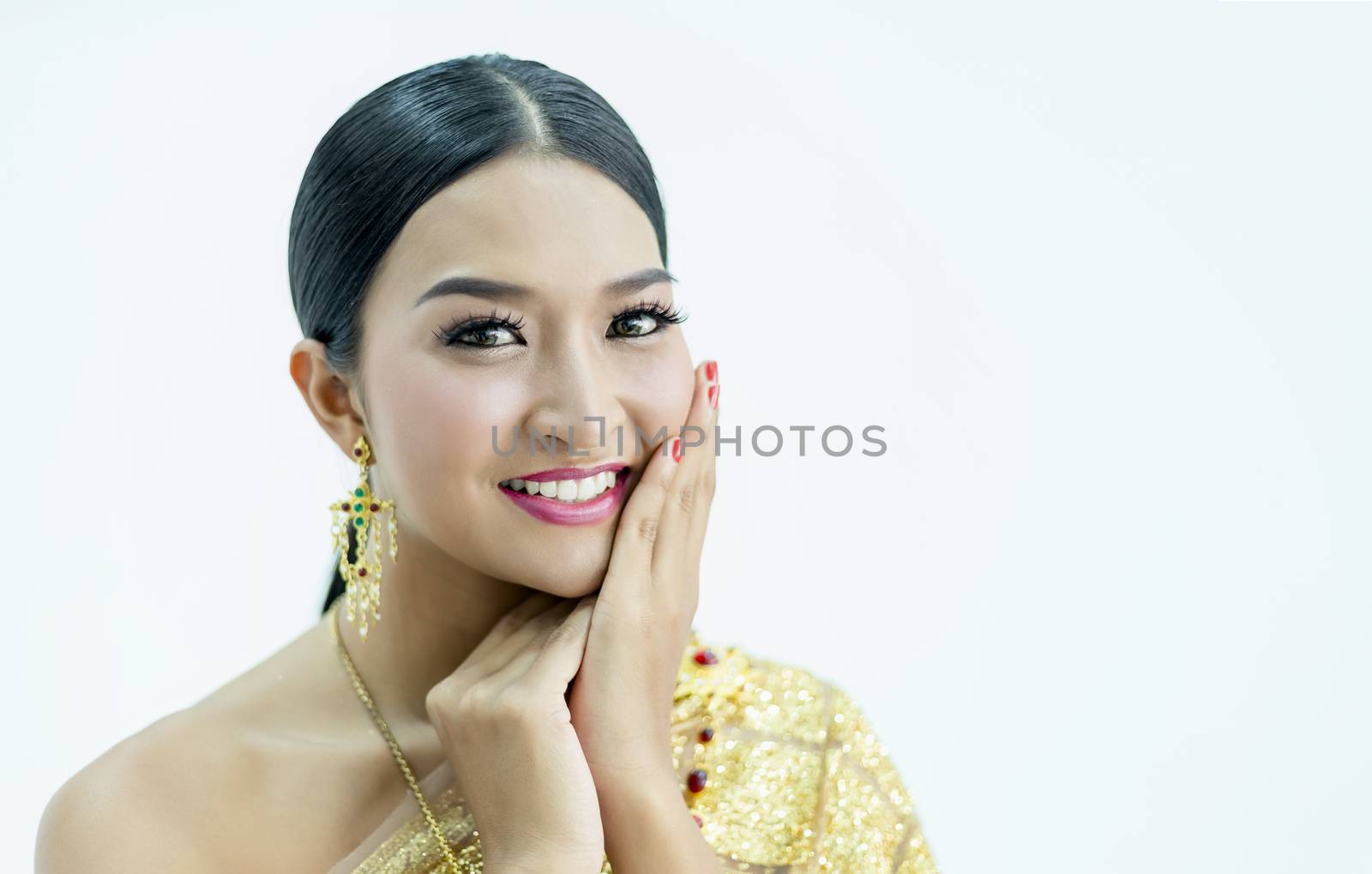 Beautiful Thai girl in traditional costume identity culture of thailand and has a beautiful smile that is a national identity