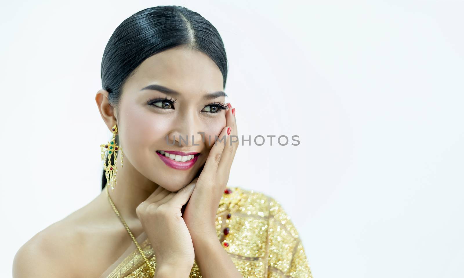 Beautiful Thai girl in traditional costume identity culture of thailand and has a beautiful smile that is a national identity