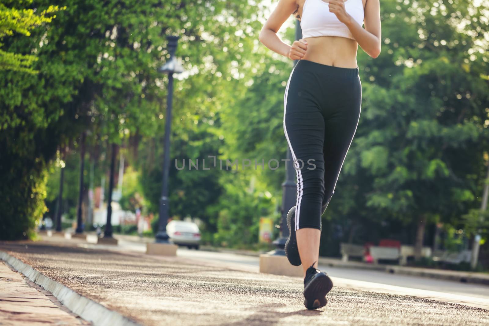 Beautiful woman jogger outdoor living healthy lifestyle in city  by numberone9018