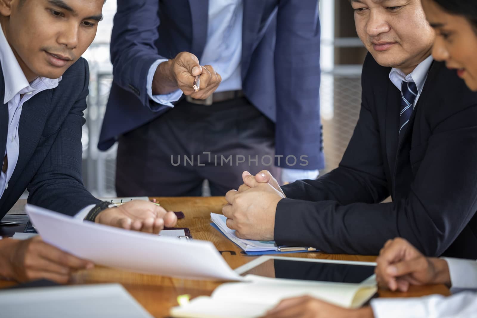 Image of business people hands working with papers at meeting. B by numberone9018