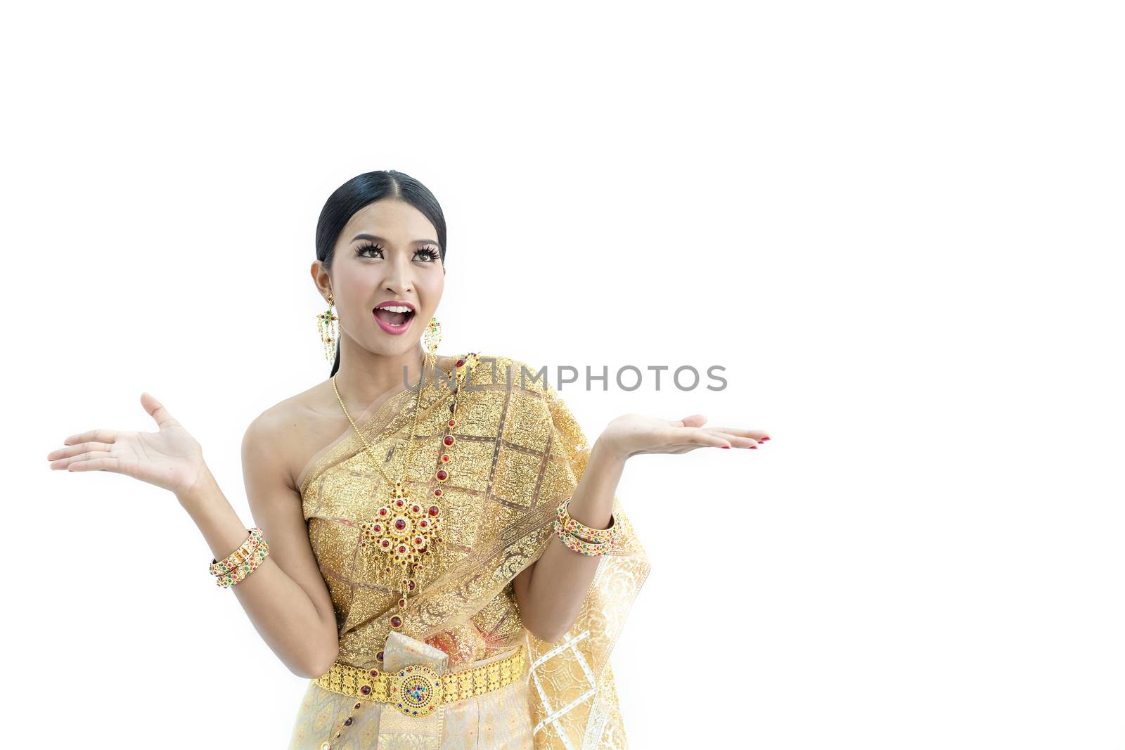 Beautiful Thai women wearing traditional Thai clothes that have a unique Thai culture. Happy asian woman with blank copyspace, isolated on white background