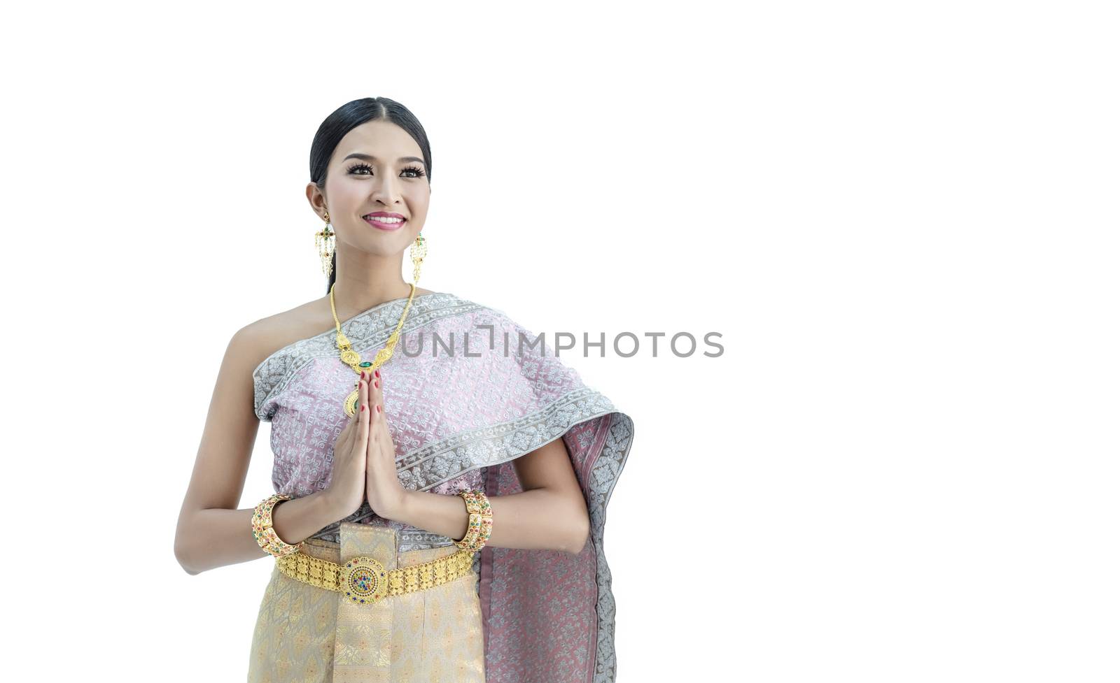 Beautiful Thai women wearing traditional Thai clothes that have a unique Thai culture. Hello, Happy asian woman with blank copyspace, isolated on white background