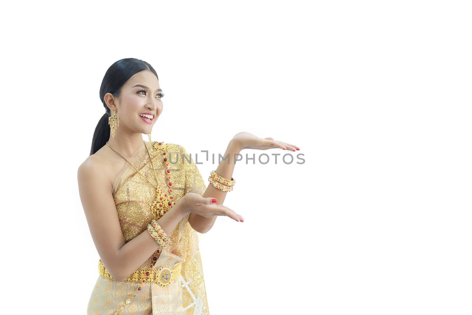 Beautiful Thai women wearing traditional Thai clothes that have a unique Thai culture. Happy asian woman with blank copyspace, isolated on white background