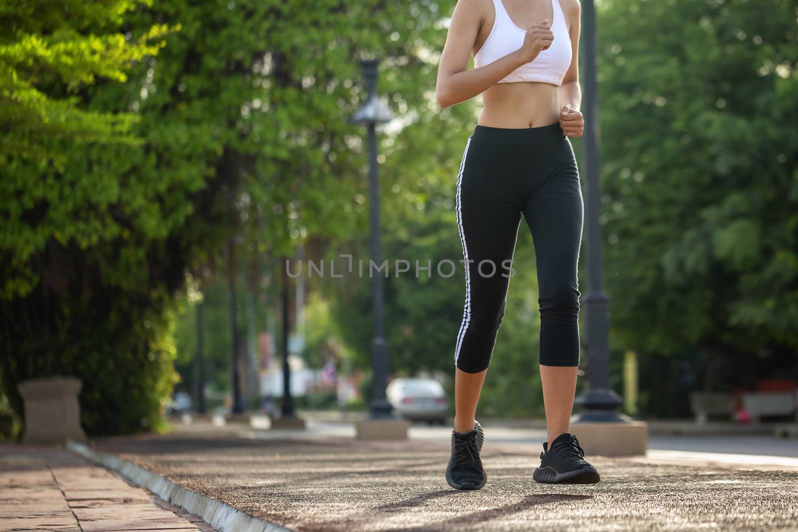 Beautiful woman jogger outdoor living healthy lifestyle in city  by numberone9018