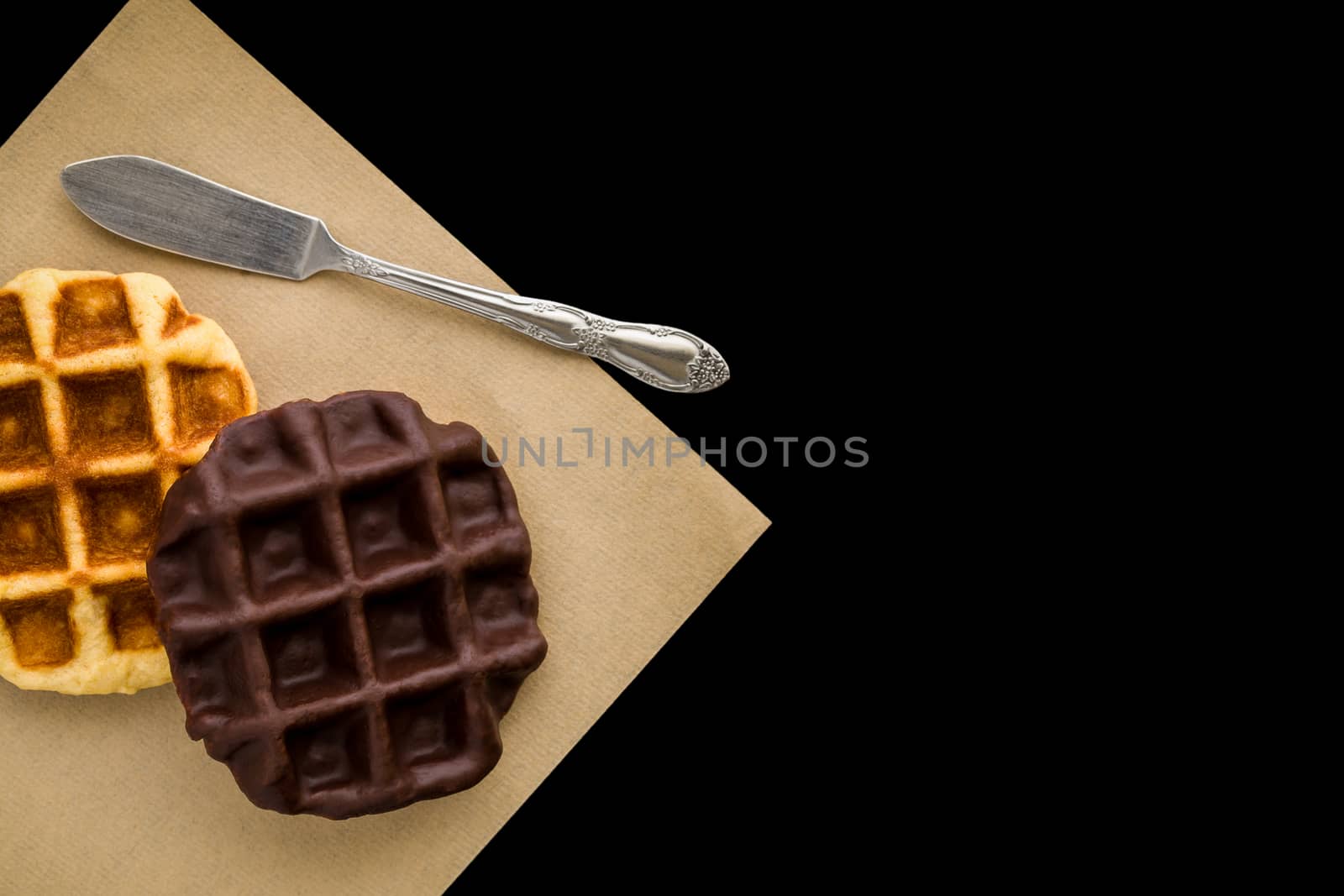 Waffle coated with chocolate as snack for breakfast.