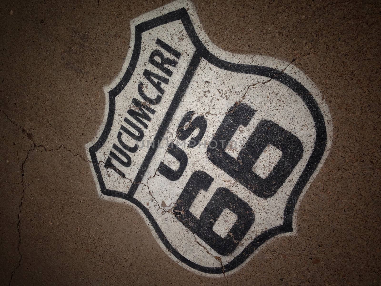 Route 66 sign painted on the road in Tucumcari