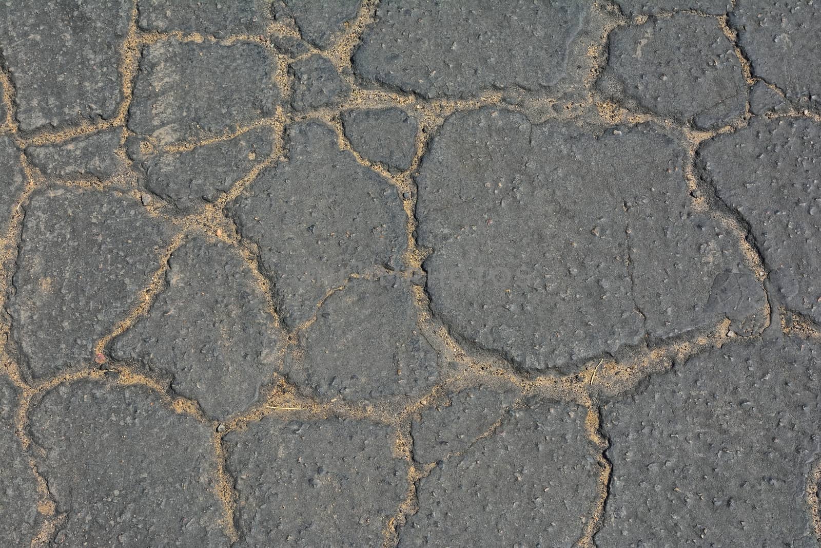 Grey cracked asphalt background. by CreativePhotoSpain