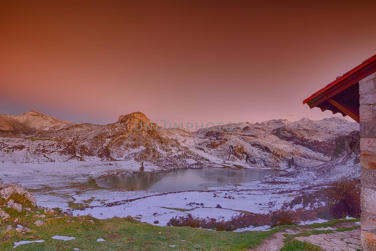 Panoramic view of Lake Ercina with snow in Asturias, Spain.