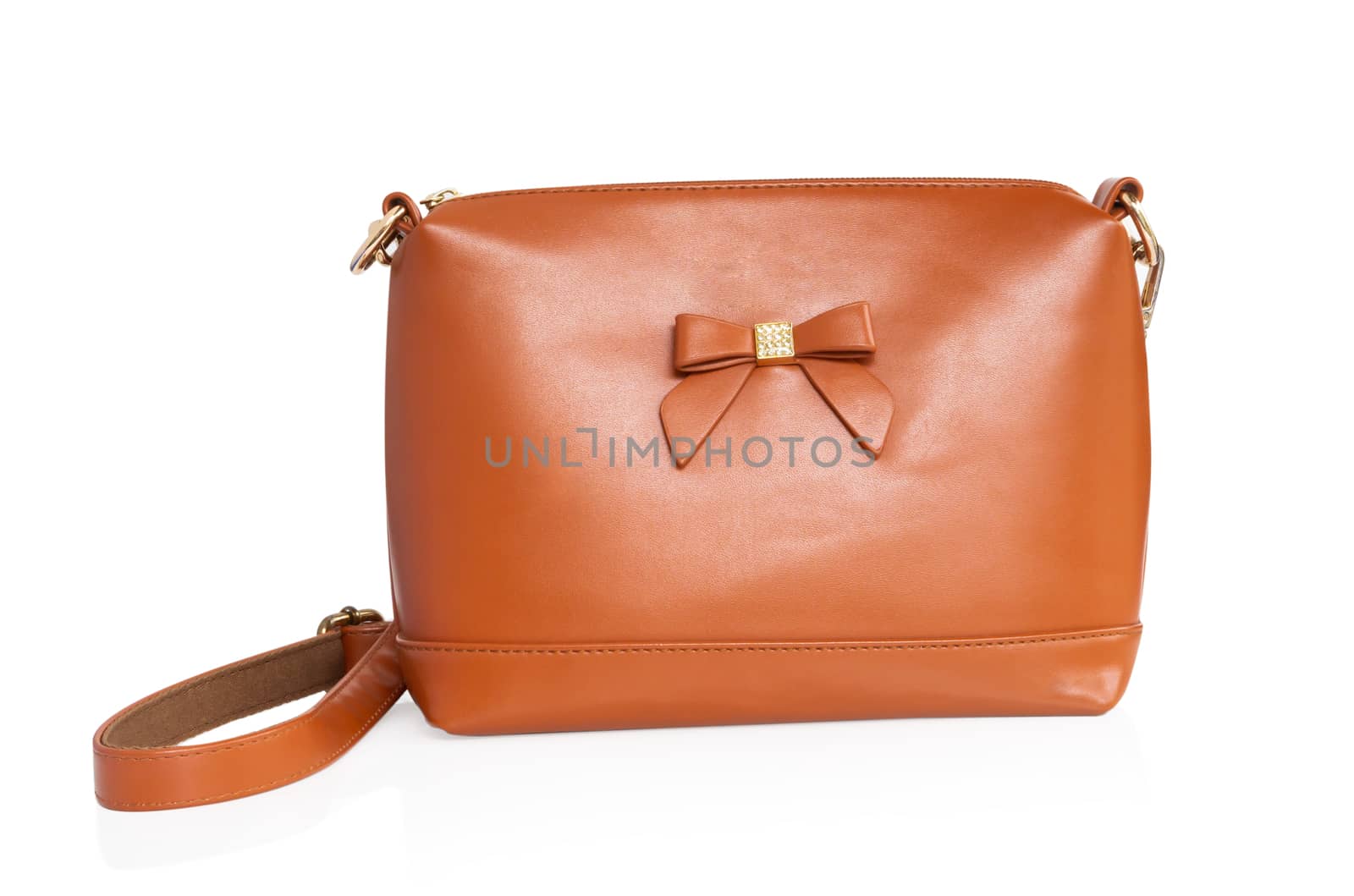 Closeup orange leather bag on white background by pt.pongsak@gmail.com