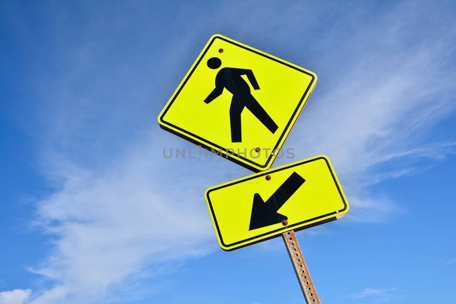Pedestrian sign, Yellow man walking road sign.
