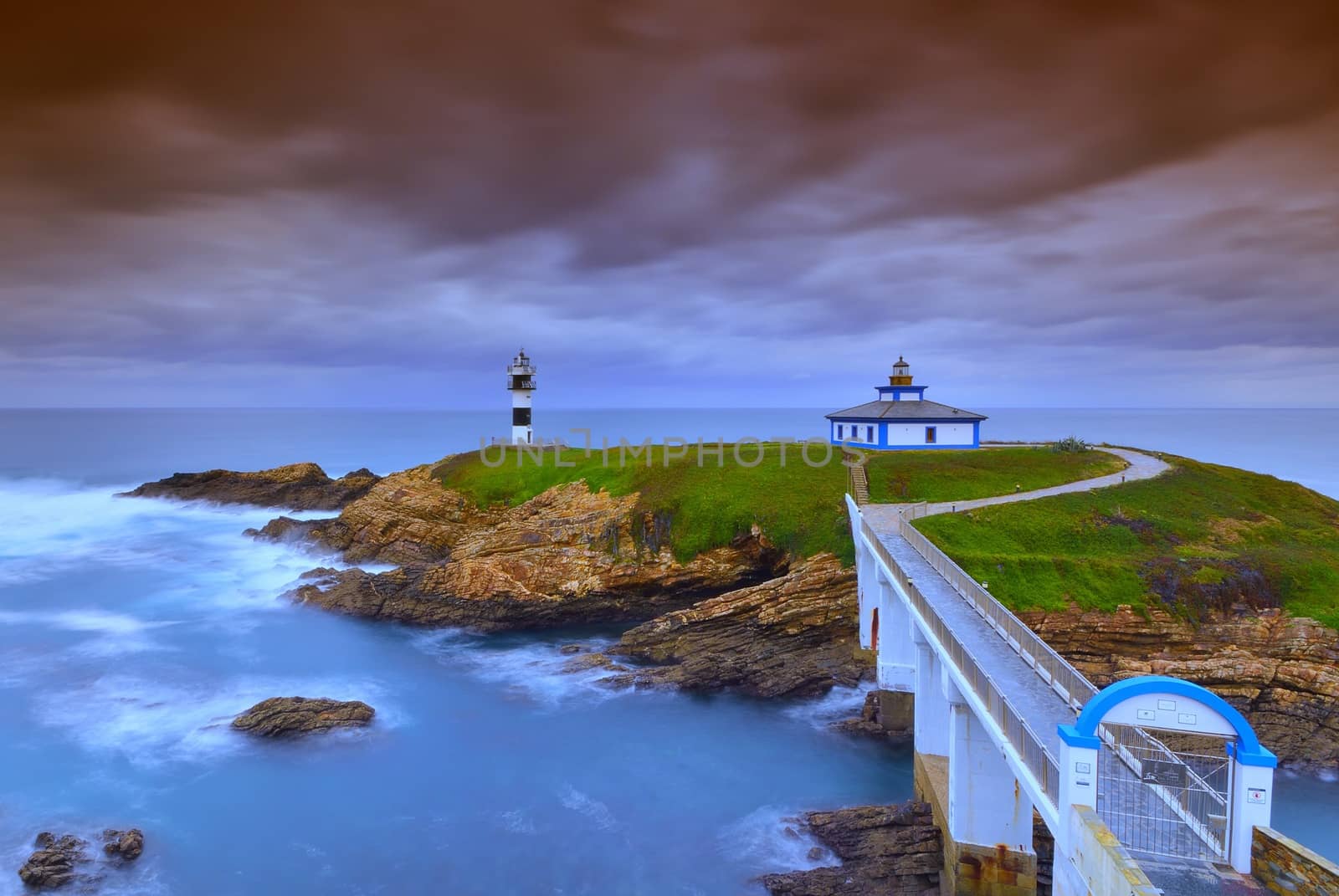 View of Pancha Island in Ribadeo, Lugo before a storm.