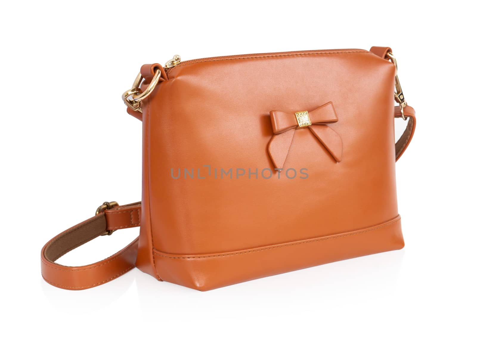 Closeup orange leather bag on white background