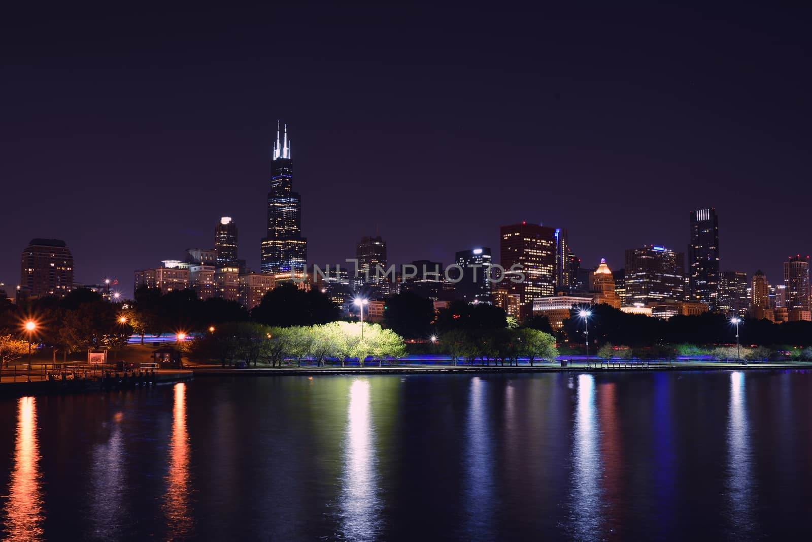 Chicago night skyline across Lake Michigan.