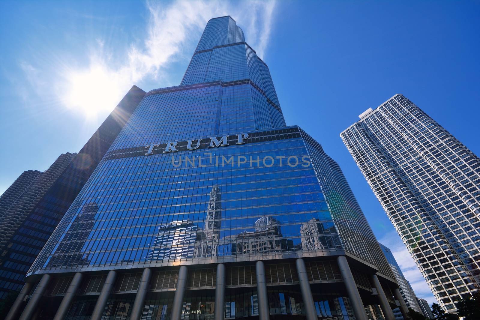 Chicago, USA - July 15, 2017: Trump Tower skyscraper building on Chicago River. Trump International Hotel and Tower, also known as Trump Tower Chicago and Trump Tower, is a skyscraper hotel in downtown Chicago, Illinois.