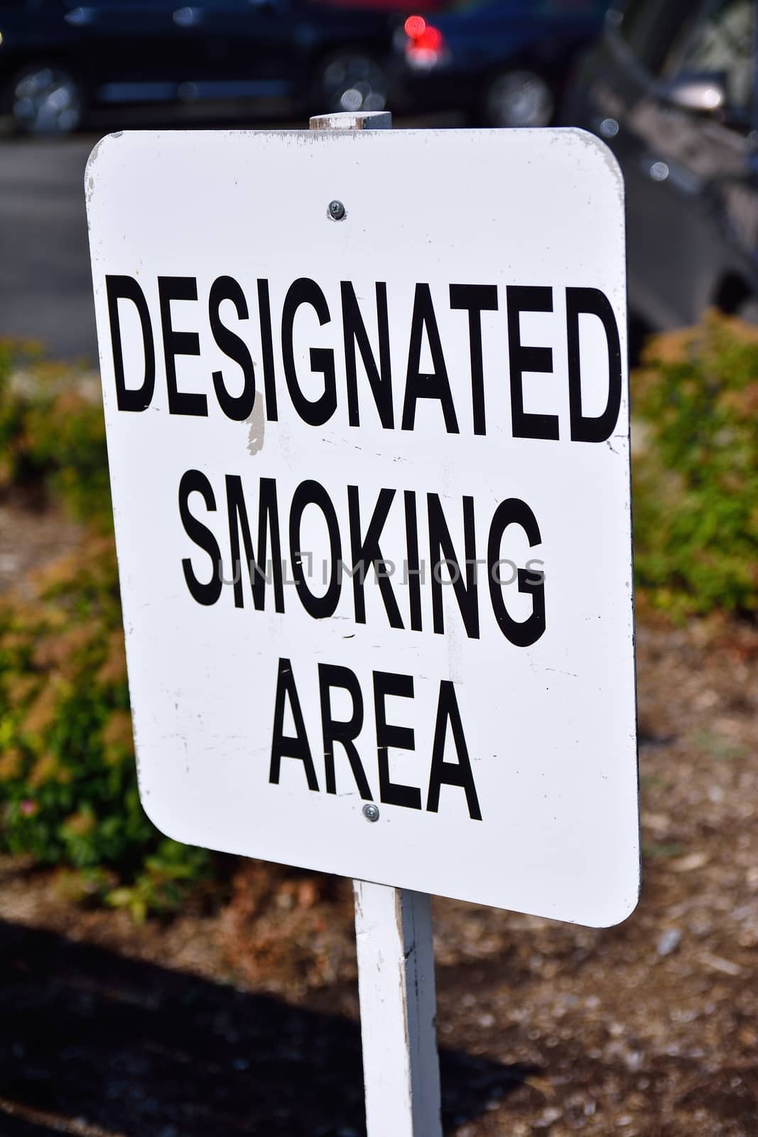 Designated smoking area sign.