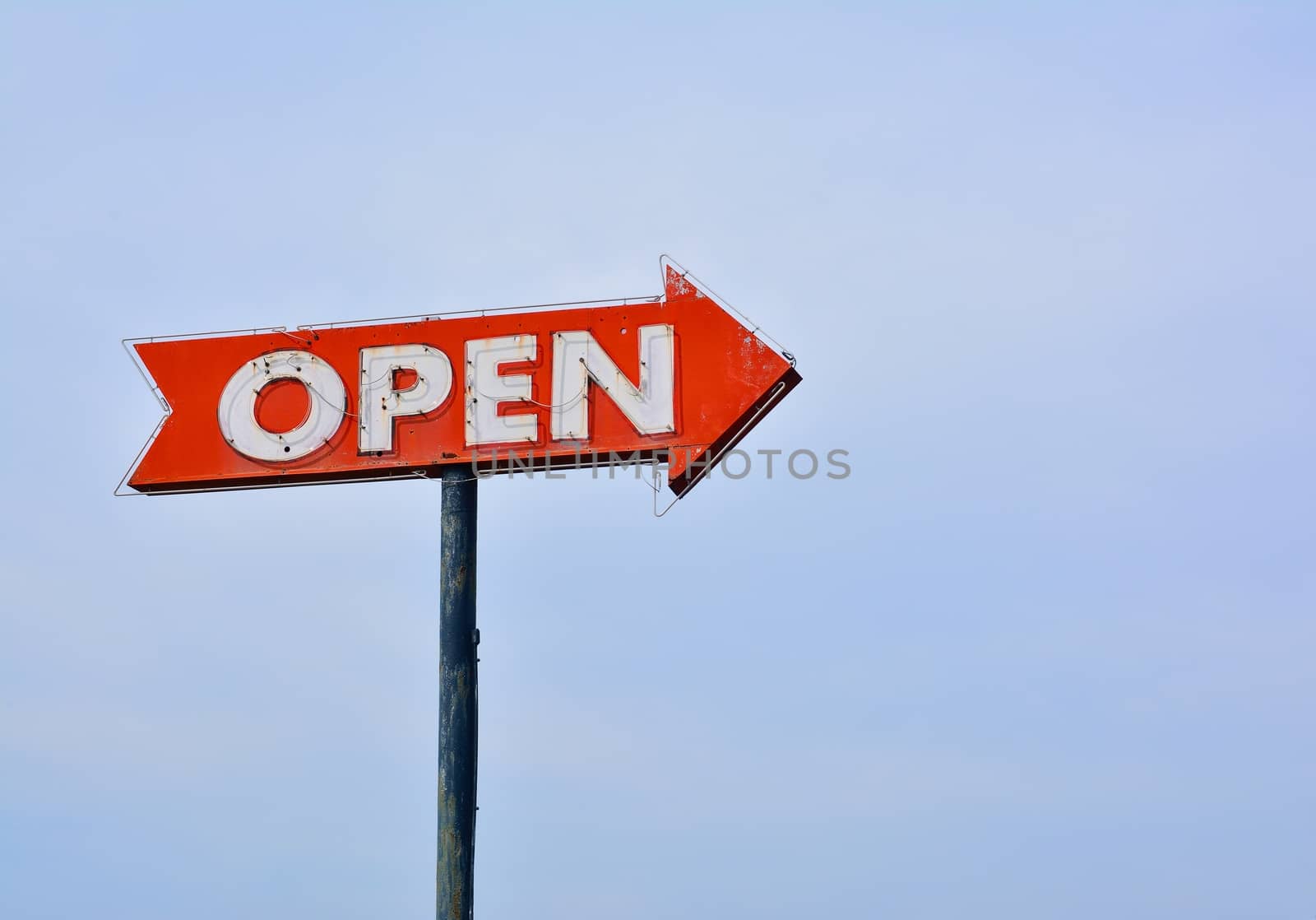 Open neon old sign in route 66.