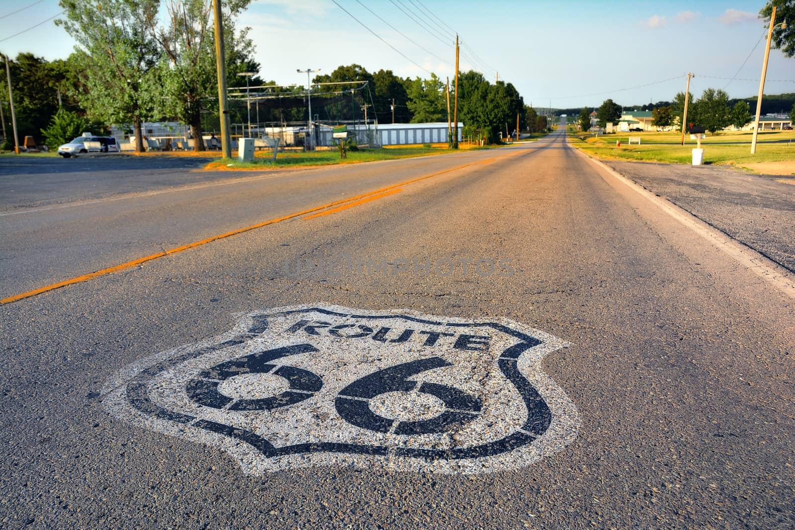 U.S. Route 66 highway, with sign on asphalt on Missouri.